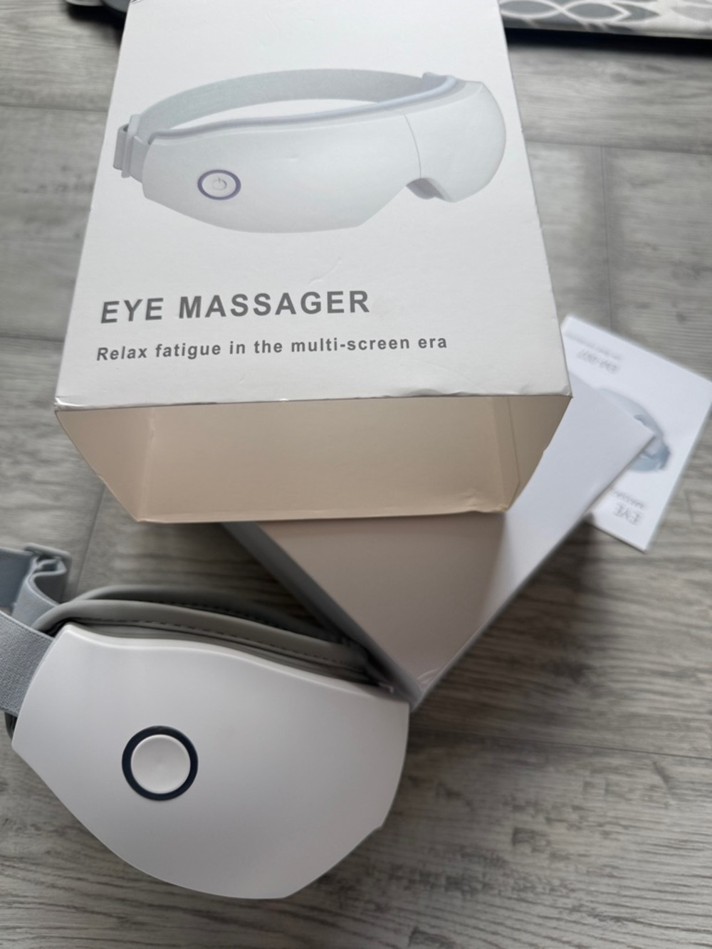 Sleek White Eye Massager with Contoured Design